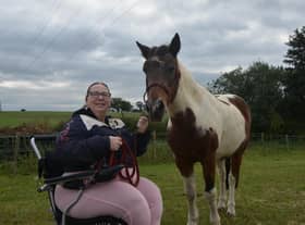 Antonia and her therapist horse, Echo.