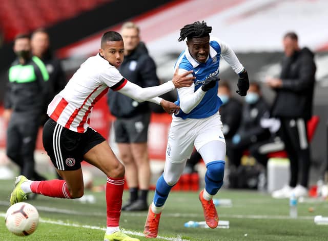 Boston United loanee Kyron Gordon tangles with Jayden Reid of Birmingham City during the Premier Development League Play-Off Final match between Sheffield United U23 and Birmingham City U23 at Bramall Lane in May 24. (Photo by George Wood/Getty Images)