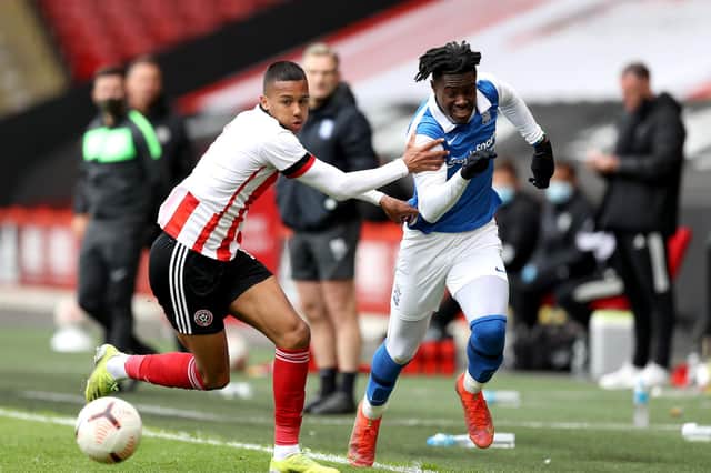 Boston United loanee Kyron Gordon tangles with Jayden Reid of Birmingham City during the Premier Development League Play-Off Final match between Sheffield United U23 and Birmingham City U23 at Bramall Lane in May 24. (Photo by George Wood/Getty Images)