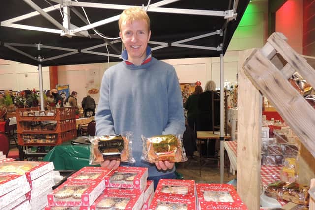 Serving up mince pies and plum bread at the food and gift fair - Pocklington's bakery of Withern, near Alford. EMN-211127-170515001