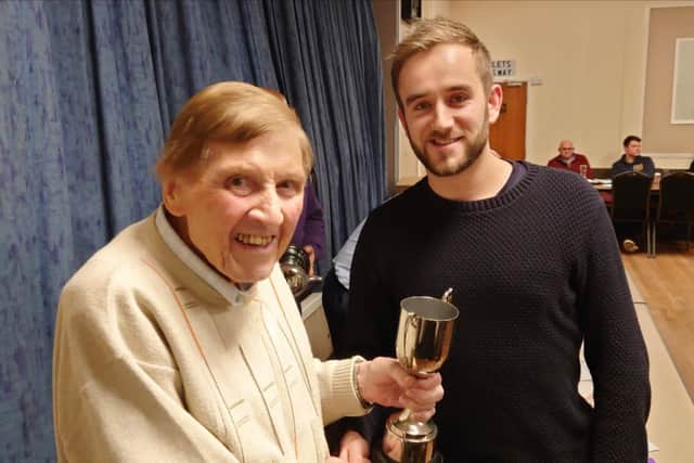 Caythorpe CC won Division Two. Chris Wharmby collected the trophy.