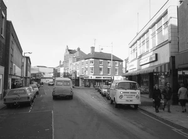 Looking down West Street from near its junction with Bridge Street towards such businesses as Abbey National.