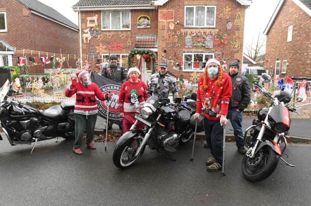 Bikers Against Child Abuse members L-R Gunner, Wolf and Chez, pictured with L-R Jacky Cooper, Val Midgley and Mick Midgley EMN-210212-111133001