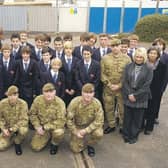 Picture (from left) Lance Sargeant Graham Nicholson, Major Lance Thornton, GdsmTom Hayward, GdsmScott Bloomer, Lance Corporal Michael Goom, Gdsm Bradley Thomas, Anne Broughton, public services instructor at St George’s Academy, and Jayne Adey, teaching assistant.