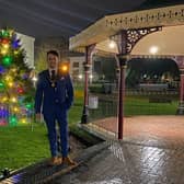 Coun Danny Brookes by the new  Christmas Tree in Tower Gardens, Skegness.