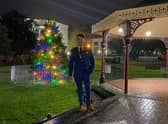 Coun Danny Brookes by the new  Christmas Tree in Tower Gardens, Skegness.
