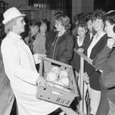 Factory manager Jean Tooley with some of the pupils.