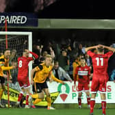 Jordan Burrow turns away to celebrate after heading home what proved to be the winner for Boston United in the 3-2 win at Kettering Town. Pictures by Peter Short