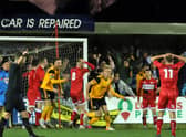 Jordan Burrow turns away to celebrate after heading home what proved to be the winner for Boston United in the 3-2 win at Kettering Town. Pictures by Peter Short