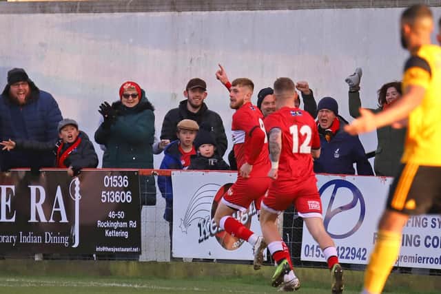Connor Kennedy celebrates after heading Kettering Town into an early lead against Boston United