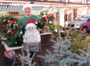Chris Ford with his Christmas wreaths and trees. EMN-210612-152316001