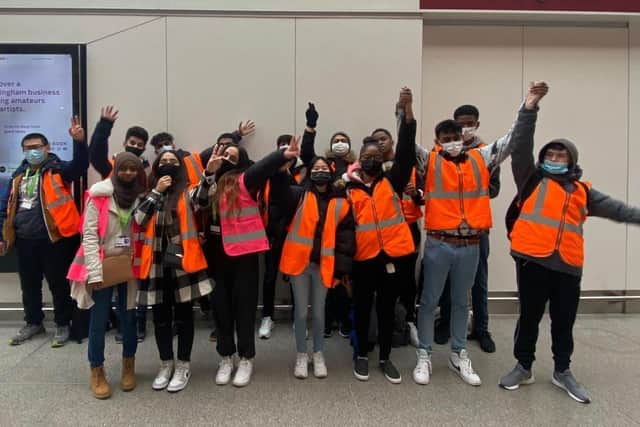 The teenage students at Nottingham railway station, learning about using trains in the UK. Photo: Poacher Line