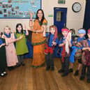 Sunita Patel, of The Indian Experience, with Neverland Class pupils.