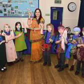 Sunita Patel, of The Indian Experience, with Neverland Class pupils.