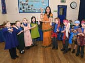 Sunita Patel, of The Indian Experience, with Neverland Class pupils.