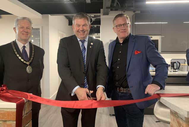 Opening the new MRI Software offices, from left - Mayor of Sleaford Coun Robert Oates, NKDC Leader Coun Richard Wright and MRI Vice President and Executive Managing Director for Europe Dermot Briody. EMN-211012-160147001