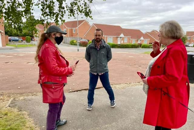 Local Authority partners, customers and officers making plans on improving a communal play area after it was vandalised.