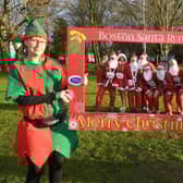 The ‘Elfie Selfie’ proved popular - pictured here framing a group of Santas as they prepare to take part in the run. Photos by David Dawson.