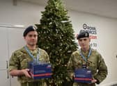 Christopher Dickinson and Joshua Jackson with festive hampers. EMN-211214-132827001