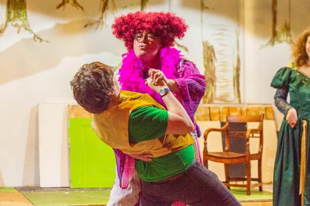 Dame Granny dances with an unwilling suitor. EMN-211217-092138001