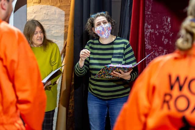 Directors Gail Hinkins and Isabel Forrester giving stage help. EMN-211217-092218001