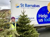 Louise Cotton with trees the hospice has previously recycled.