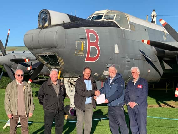 Representatives of Newark Air Museum and the Lincolnshire’s Lancaster Association sign paperwork confirming the ownership of the Avro Shackleton, WR977 and the Avro Vulcan, XM594 being immediately transferred to NAM. EMN-211215-153607001