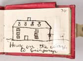 A notebook containing drawings by Tennyson as a child. EMN-211220-092416001