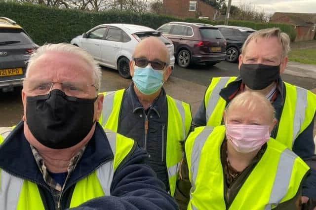 Rotary Club members Tony Tye and Bob Field and friends Pete and Bev who collected the food to take to Wainfleet and Skegness.
