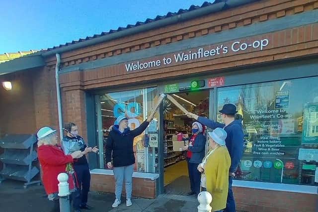 A guard of honour for Mary Smith, who is leaving Wainfleet Co-op after 20 years.
