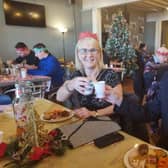 Mayor and Mayoress of Skegness Coun Trevor and Mrs Jane Burnham taking time to dine with the elderly and vulnerable at the Skegness Standard Big Christmas Feast at the Storehouse in Skegness.