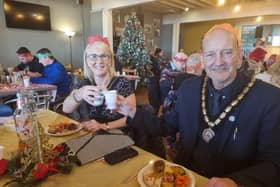 Mayor and Mayoress of Skegness Coun Trevor and Mrs Jane Burnham taking time to dine with the elderly and vulnerable at the Skegness Standard Big Christmas Feast at the Storehouse in Skegness.