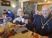 Mayor and Mayoress of Skegness Coun Trevor and Mrs Jane Burnham taking time to dine with the elderly and vulnerable at the Skegness Standard Big Christmas Feast at the Storehouse in Skegness.