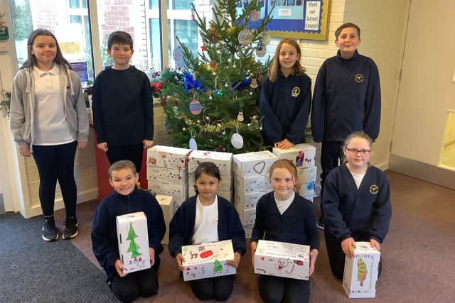 The school council at Grainthorpe Junior School with the shoeboxes.