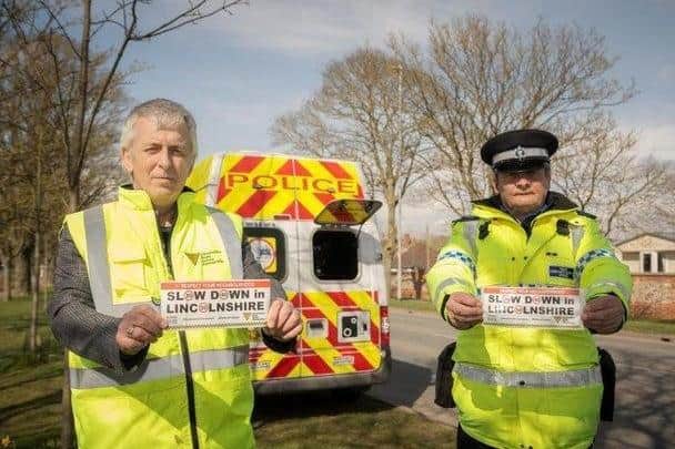 John Siddle from the Lincolnshire Road Safety Partnership and PCSO Dave Bunker with their bumper stickers for the new campaign they want drivers to get behind.