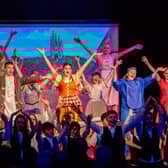 Singing and dancing in Cinderella. EMN-211220-155802001