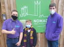 Ethan meets some of the team at the YMCA in Lincoln. EMN-211230-183034001