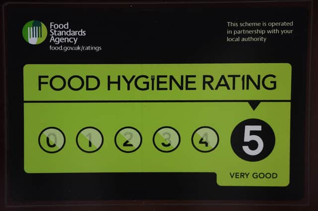 A Food Standards Agency rating sticker.EMN-211230-125202001