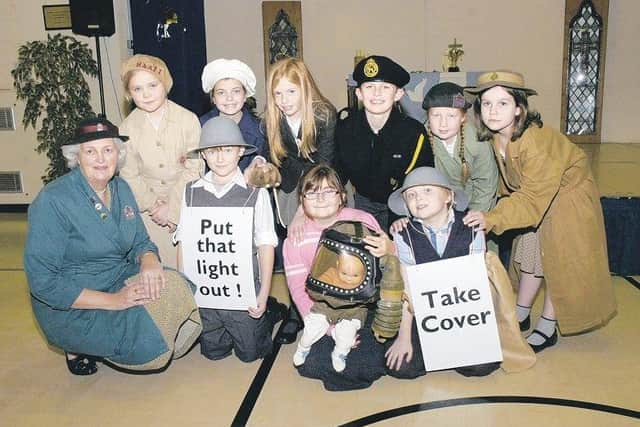 St Botolph's pupils with Beverley Bowling of Portals to the Past.