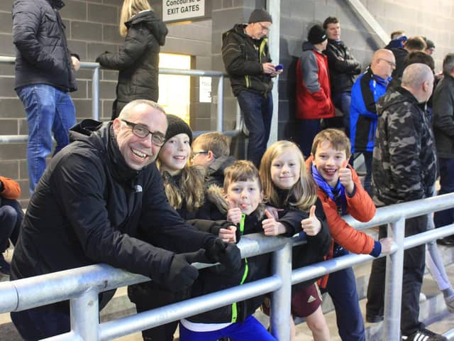 Supporters watch Boston United versus Alfreton. Photo: Oliver Atkin