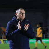 Craig Elliott applauds fans in his final game as manager. Photo: Oliver Atkin