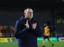 Craig Elliott applauds fans in his final game as manager. Photo: Oliver Atkin