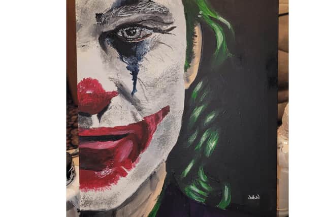 A painting of the Joker.
