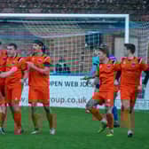 Town celebrate Lockie's leveller at Boston. Photo: Craig Harrison