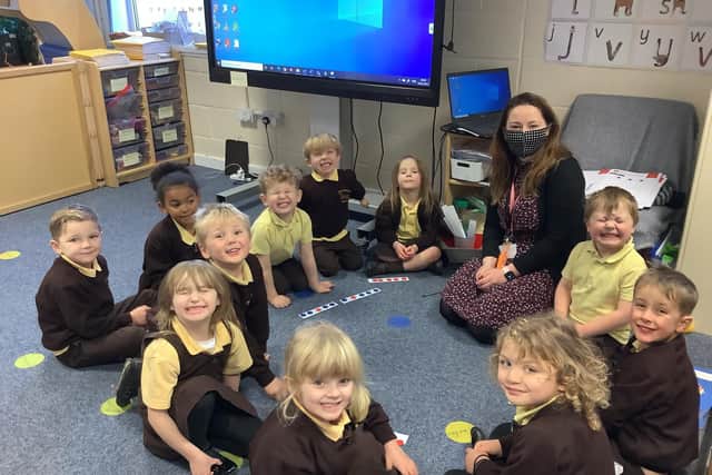 Adapting to the new legislation - Richmond School teacher Alice Sharp with her Early Years Foundation Stage pupils.