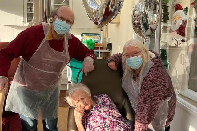 Bea celebrating her 103rd birthday with her son, Simon, and daughter-in-law.