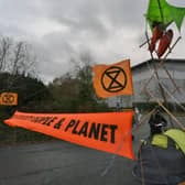 Extinction Rebellion protestors at Amazon Peterborough EMN-211126-090800009