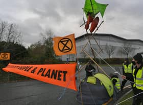 Extinction Rebellion protestors at Amazon Peterborough EMN-211126-090800009