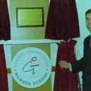 Prince Andrew unveiling the commemorative plaque for the new classroom block in William Alvey School in November 1997. EMN-220117-121530001