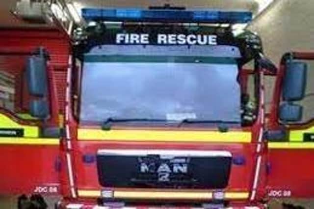 In an emergency dial 999 and ask for the fire service.